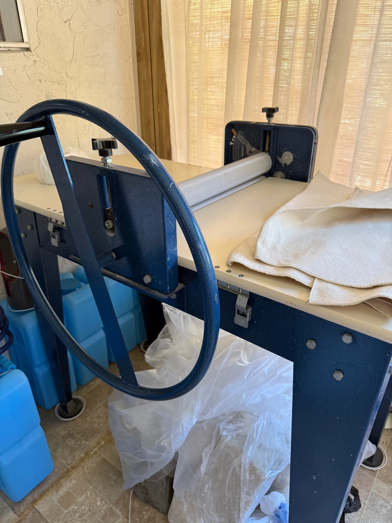 North Star slab roller with its large blue wheel