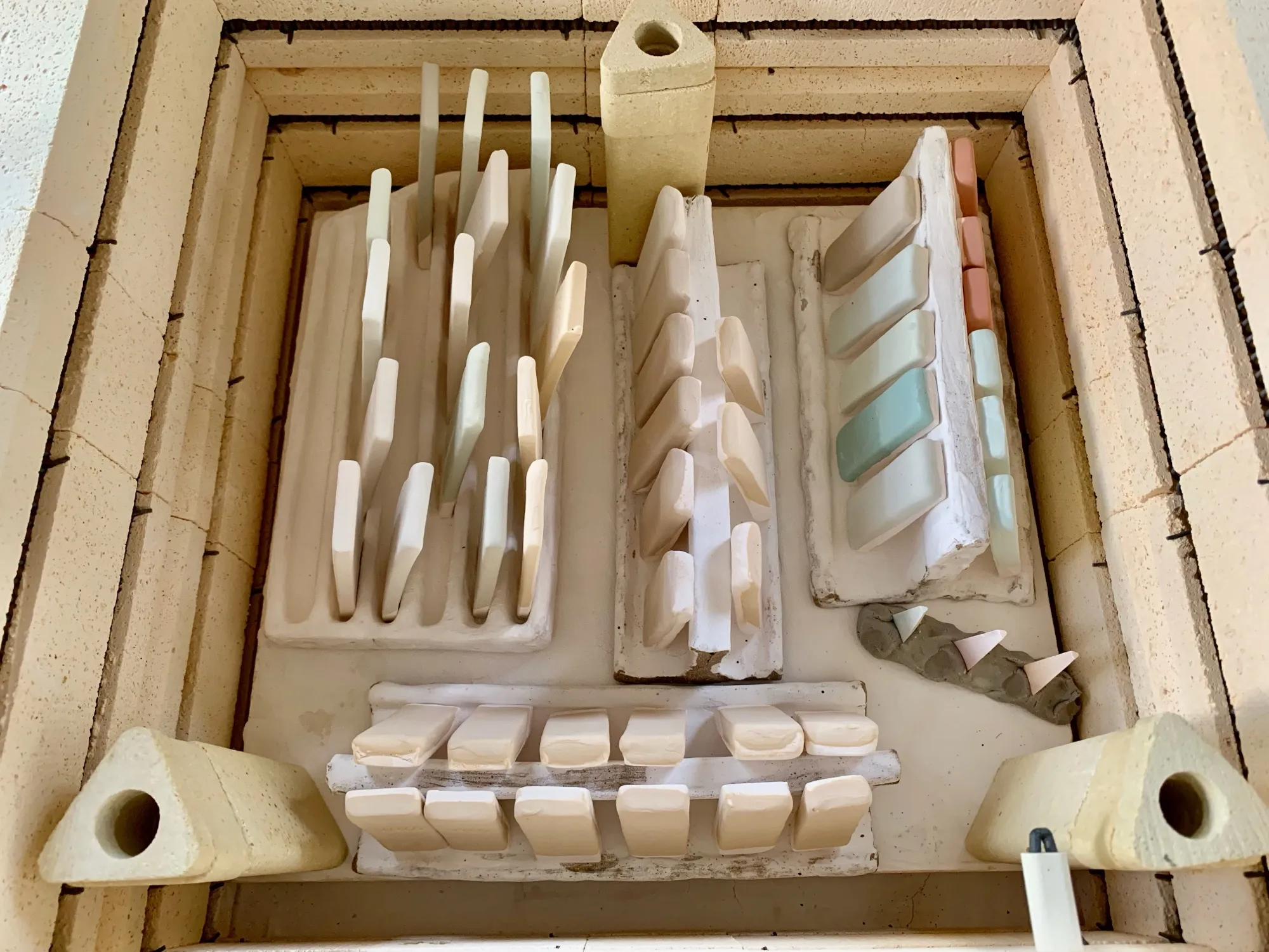 Inside the test kiln, loaded with test tiles